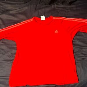 Large adidas red shirt with striped sleeves